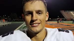 Wing-T of Crusaders rushes past Maroons