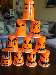 Two Much Fun Easy And Fun Halloween Knock Down Game Halloween Games For Kids Halloween Carnival Games Halloween Block Party