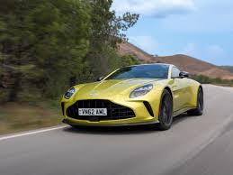Image result for New Yellow 2016 Aston Martin