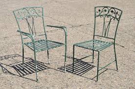 Add to favorites industrial style distressed clear coated metal bistro dining chair with arms and laminated bamboo wood seat. 5 Piece Vintage Salterini Leaf And Vine Patio Garden Dining Set Oval Table At 1stdibs