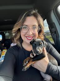 What are the pros and cons of neutering a Doberman at 1 year old?