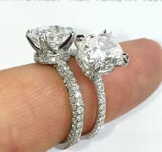 The delicate designs were typically symbolic, featuring hearts, hands, and other motifs representing love and unity. Engagement Ring Band Styles Three Row Vs Single Row