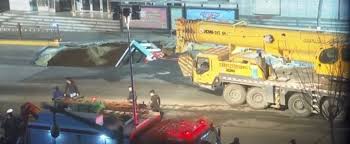 giant sinkhole swallows an entire bus