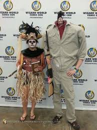 First, tie a string around a doughnut, then hang it between two chairs. Harry The Hunter And Voodoo Shaman Costumes From Beetlejuice On A Budget Beetlejuice Halloween Beetlejuice Costume Beetlejuice