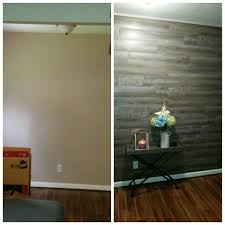 Peel And Stick Luxury Vinyl Floor Planks On Wall I Used Tacks In The Corners Of Each To Make It More Ru Flooring On Walls Vinyl Flooring Vinyl Wood Flooring