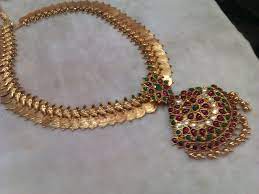 The long haram and the necklace that i got from nac blended perfectly with my looks. Beautiful Temple Jewellery By Nac Jewellers