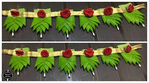 Banana Leaf Thoran Ganesh Chaturthi Decoration Ideas With Banana Leaves Banana Leaves Decorati In 2020 Flower Decorations Diy Fabric Flowers Diy Flower Decorations