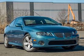 Image result for Dark Ming Blue 2004 Pontiac