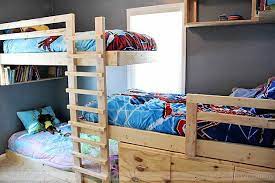 String or rope lights under the top bunk. 20 Efficent Solutions For Decorating Triplet Bedroom Triple Bunk Beds Triple Bunk Bed Bunk Bed Designs