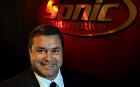Sonic automotive misses earnings estimate, lowers guidance