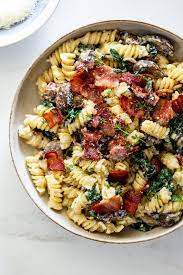 Easy Baked Feta Pasta With Bacon And Mushrooms Simply Delicious Recipe In 2021 Feta Pasta Bacon Pasta Bacon Pasta Recipes