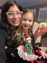 Police officer helps with Elf