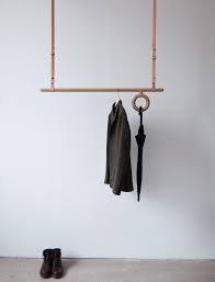 Velg blant mange lignende scener. Florian Saul Designs A Wood And Leather Hanging Coat Rack Hanging Coat Rack Design Decor Design