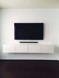Cut as many wood boards as you need to fit your electronic devices. Floating Tv Console