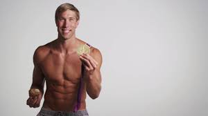 Swimmer who won a gold medal in 2012 while setting an olympic record in the 100m backstroke. Swimfasterfood What To Eat At A Meet With Olympian Matt Grevers Muffins Or Medals Youtube