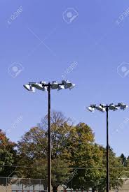 Outdoor Light Poles In A Tennis Court Against A Blue Sky And Stock Photo Picture And Royalty Free Image Image 21994743