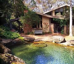 I Love The Shallow Section Of This Pool With The Boulders Nothing Worse Than Having To Jump Into A Pool Garden Pool Natural Swimming Ponds Fish Pond Gardens