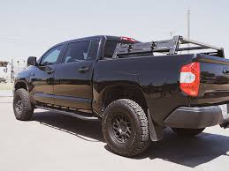 Stepping up to the larger tundra trail, it's gussied up with a chrome grille pilfered from the fancy 1794 model. 2014 2021 Toyota Tundra Trail Edition Rock Sliders
