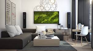 The chosen blue colour shades are just dusky enough to exude a natural appeal, creating a living room which is calming but avoids being bland. Modern Apartment Design With Several Beautiful Natural Elements Roohome