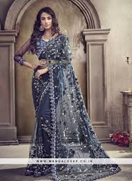 In fact, bollywood divas like sonam kapoor wore graceful sarees to international film festivals like cannes. Party Wear Embroidered Saree In Blue Color With Embroidery Work