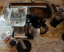 1) beans do not drop into the grinder (beans are too oily). April S Kitchen Counter