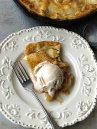Cinnamon sugar coated apples sandwiched between two layers of flaky pastry crust and baked in a cast iron skillet. Skillet Apple Pie With Homemade Cinnamon Ice Cream Miss In The Kitchen