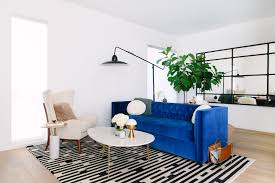 Black And White Rug Living Room Ideas Blue Velvet Sofa With A Black And White Rug Blue Living Room Velvet Sofa Living Room Blue Velvet Sofa