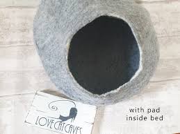 Don't see how making 400%profit benefits nepalese workers. Cat Bed Cat Cave Cat House Cat Igloo Felted Wool In White And Black With Toy Ball For Cats