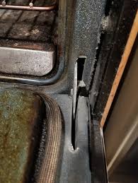 Look for any disconnected wires in the door lock. Ge Wall Oven How To Replace Door Hinge Doityourself Com Community Forums