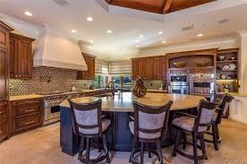 But if you're one of the people who have been on the fence about whether or not an island would be a great fit for your kitchen, you can rest assured that you won't regret your choice to incorporate an island into your space. 101 Kitchen Islands With Seating For 2 3 4 5 6 And 8 Chairs And Stools Kitchen Design Kitchen Island With Seating Kitchen Layout