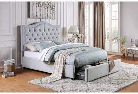 A bedroom suite that beckons you to linger longer with a good book or your morning coffee, the carter collection sports a button tufted headboard and padded rails along with convenient storage footboard. Home Style Carter Upholstered Beds Queen Upholstered Storage Bed Walker S Furniture Upholstered Beds