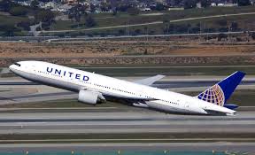 A united airlines boeing 777 suffered major engine failure in midair and was forced to make an emergency landing at denver international airport, while scattering debris across several neighborhoods. Watch Debris Falls From The Sky As United 777 Engine Catches Alight