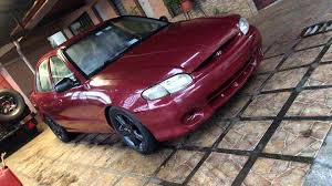 Image result for Cardinal Red 1999 Hyundai