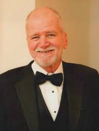 Obituary of John E Morgan