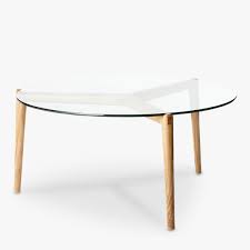The circular shape raised on stylishly carved wooden legs is indeed a special design. Stobie Coffee Table Oak Glass Top Great Dane