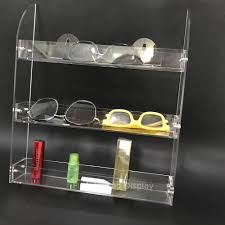 Mounted on a wall in the bar or kitchen, this attractive wooden rack makes an elegant display celebrating the love of wine, and can hold a dozen standard wine glasses, or a mix of burgundy, zinfandel, rosé, port, sherry, and bordeaux glasses, or champagne flutes and tulips. Wall Mounted Store Display 6pcs For Sunglasses Eyewear Glasses Rack Holder Stand Display Buy At The Price Of 36 70 In Aliexpress Com Imall Com