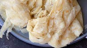 Easy Paratha Oil Roti Is A Step By Step Tutorial Of How To Make Roti A Flat Bread With Indian Influences The Recipe Cooking Recipes Food Caribbean Recipes