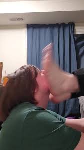 Foot slapping and abusing a slaves face - ThisVid.com