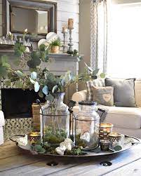 Table centerpieces are decorative elements you'll find in almost every household. Breathtaking 45 Farmhouse Table Centrepiece To Get Inspiration For Home Decoration Ht Farmhouse Table Centerpieces Farmhouse Table Decor Coffee Table Farmhouse