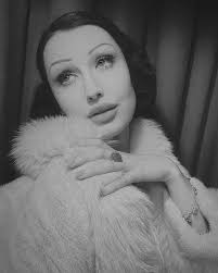 April — 1. 1930s rayon knit with matching hat and belt — one of my all time  favourite sets. Finally polished and wearing my fly broach. It needs a snap  along the