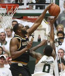 Wichita State Center Shaquille Morris Tries To Block The Shot Of Colorado State Forward Kimani Jackson D Wichita State Basketball Games For Kids Wsu Basketball