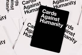 Each round, one player asks a question from a black card and everyone else answers with their funniest white card. Cards Against Humanity Home Facebook