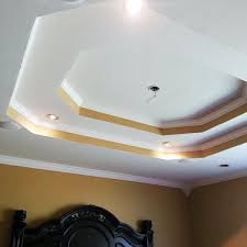 Wooden recessed tray ceilings are a good way to carry the wood grain of your shelving or flooring around the room and create a natural, rustic look. Top 50 Best Tray Ceiling Ideas Overhead Interior Designs Tray Ceiling Tray Ceiling Ideas Ceiling Design Living Room
