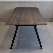 zwart transparante tafel eiken verjongd met uitlopende buispoten in zwart lijn m tafel op maat tafel tafels