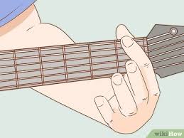 As mentioned, adjusting an acoustic guitar's bridge height requires some surgery to the bridge saddle. 4 Ways To Set Up A Guitar Wikihow