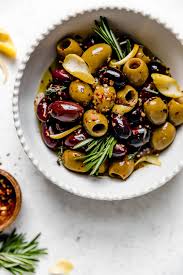 Easy Marinated Olives 7 Simple Ingredients Plays Well With Butter Recipe Marinated Olives Olive Recipes Healthy Finger Foods