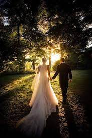 Light Streaming Through The Trees Gorgeous Wedding Photo Idea Romantic Outdoor Wedding Outdoor Wedding Photos Wedding Photos Poses
