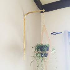 Get those plants off the floor and hang them from your wall using our modern brass bracket. Brass Planter Bracket Modern Plant Hanger Decorative Wall Etsy Plant Bracket Brass Planter Wall Mount Planter