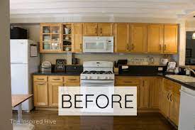 The 90's decade really loved oak cabinets and gold lighting fixtures. Vintage Inspired Kitchen Design Plan The Inspired Hive