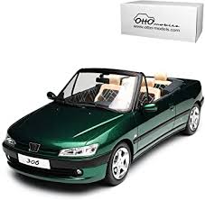 Depuis 30 ans peugeot et le tournoi de roland garros s'unissent pour vous proposer une ligne automobile exclusive. Peugeot 306 Cabrio Roland Garros Grun 1993 2002 Nr 583 1 18 Otto Modell Auto Mit Individiuellem Wunschkennzeichen Amazon De Spielzeug